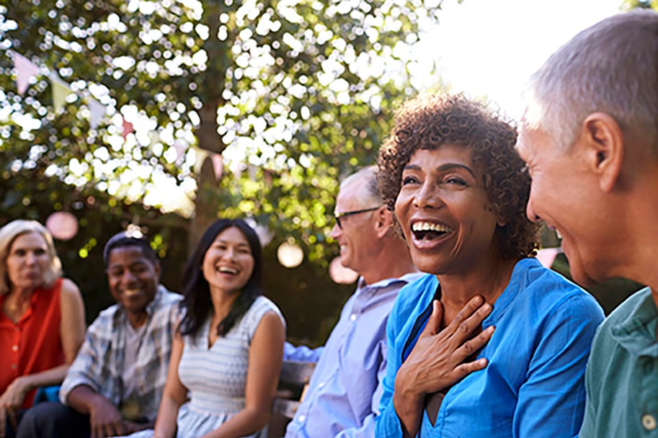 A group of people laughing.