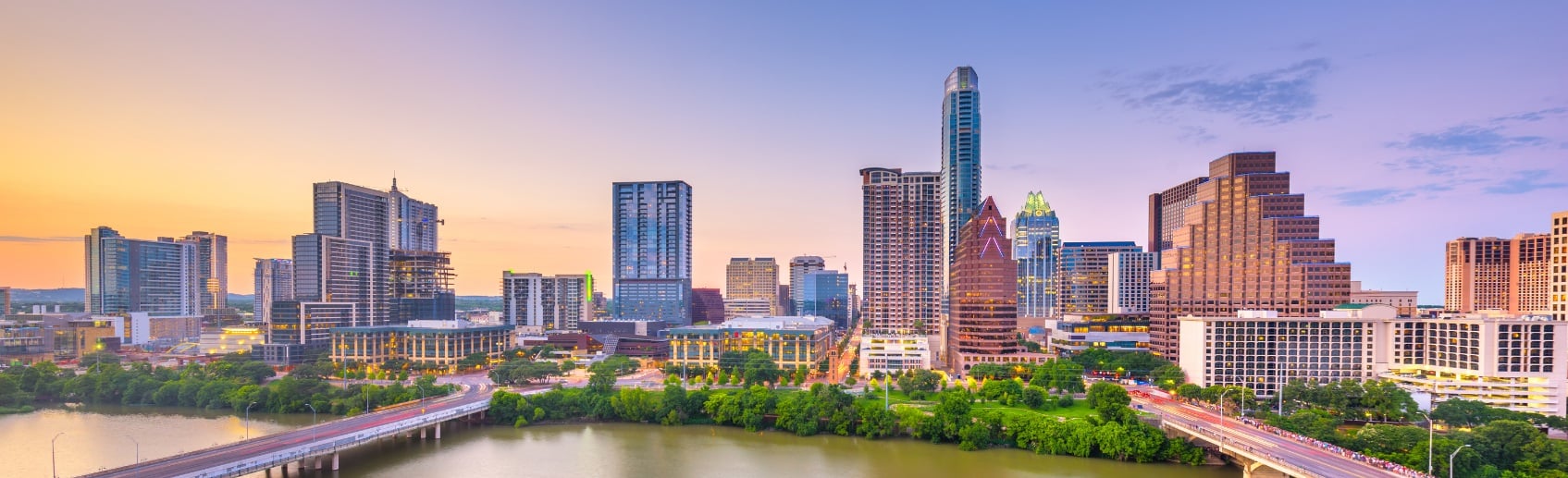A city skyline with a river.