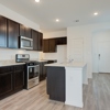 Kitchen in Whitney plan at 4422 Chandler Road, building #31 at Covington in San Antonio by Century Communities