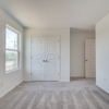 Secondary bed in Whitney plan at 4422 Chandler Road, building #31 at Covington in San Antonio by Century Communities