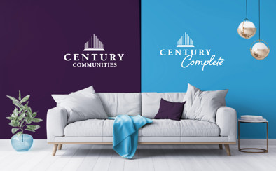 Couch and blanket with a branded Century Communities background