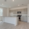 Another image of the Kitchen in the Emory plan at 4422 Chandler Road, building #33 at Covington in San Antonio by Century Communities