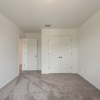 A secondary bedroom in Emory plan at 4422 Chandler Road, building #33 at Covington in San Antonio by Century Communities