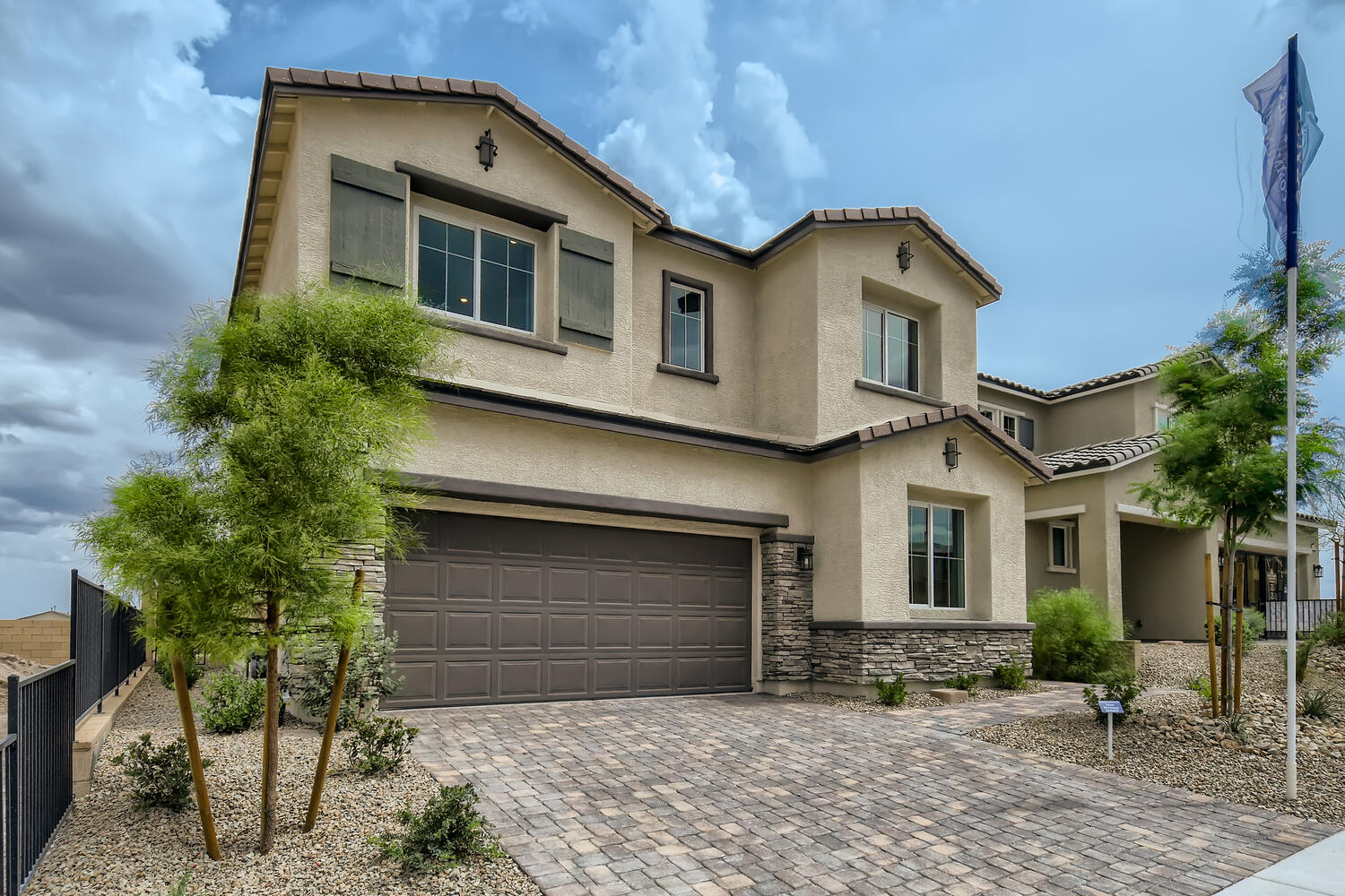 A building with a brick driveway.