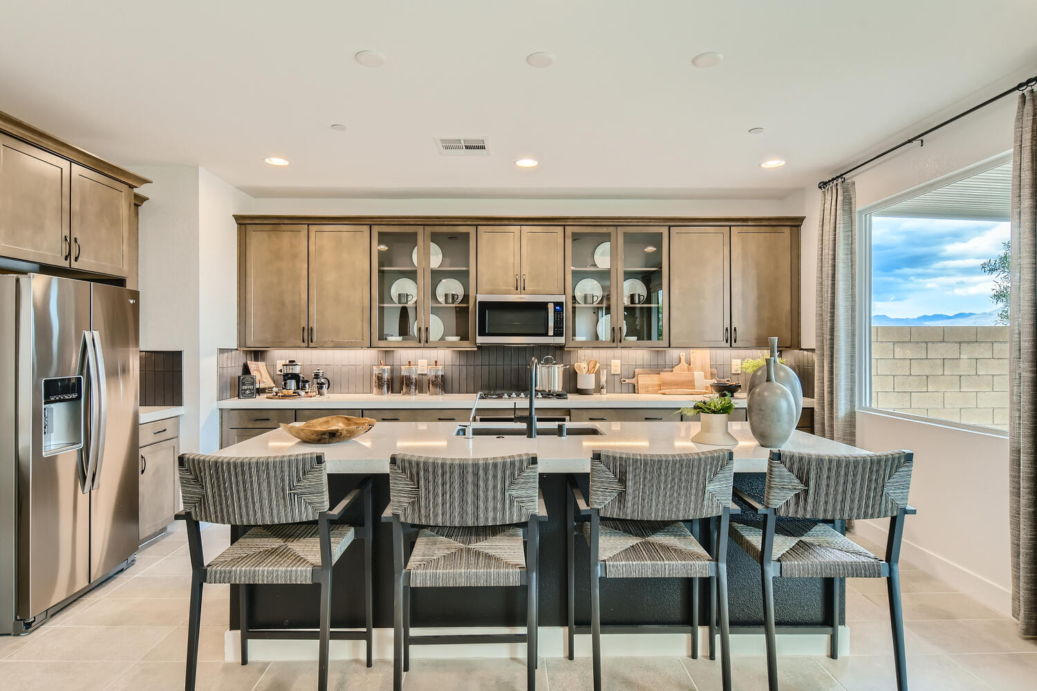 A kitchen with a large island.