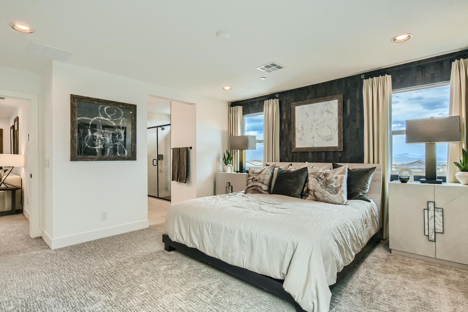 A bedroom with a large bed.