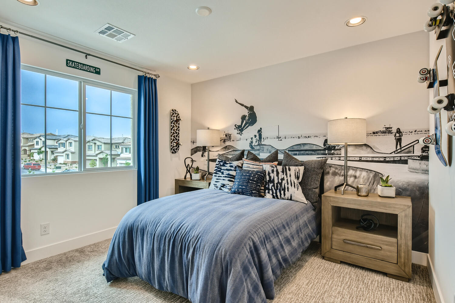 A bedroom with a bed and a window.