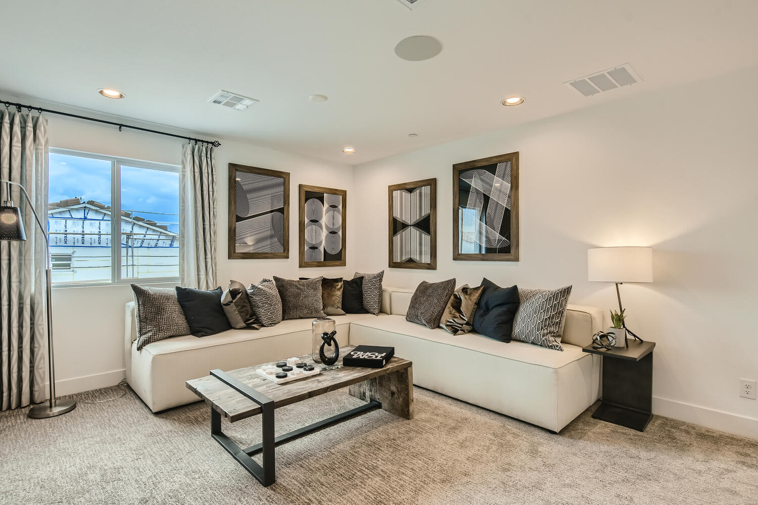 A living room with a couch and a coffee table.