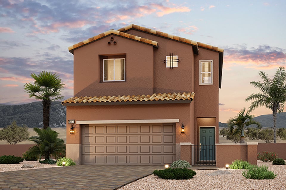 A house with a garage and palm trees.