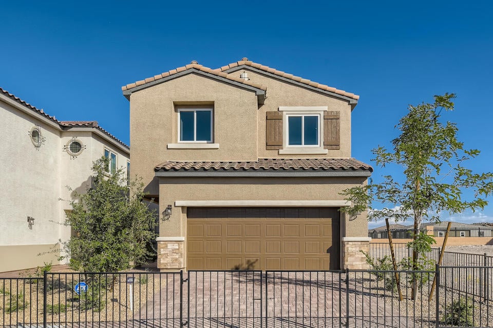 A house with a fence around it.