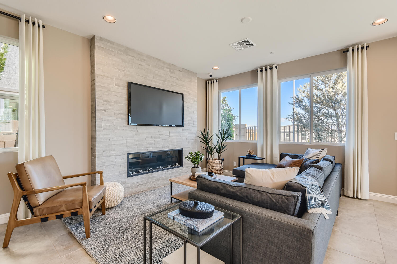 A living room with a fireplace.