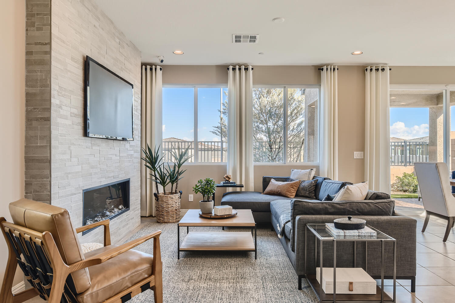 A living room with a fireplace.