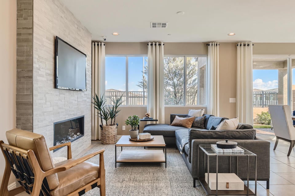 A living room with a fireplace.
