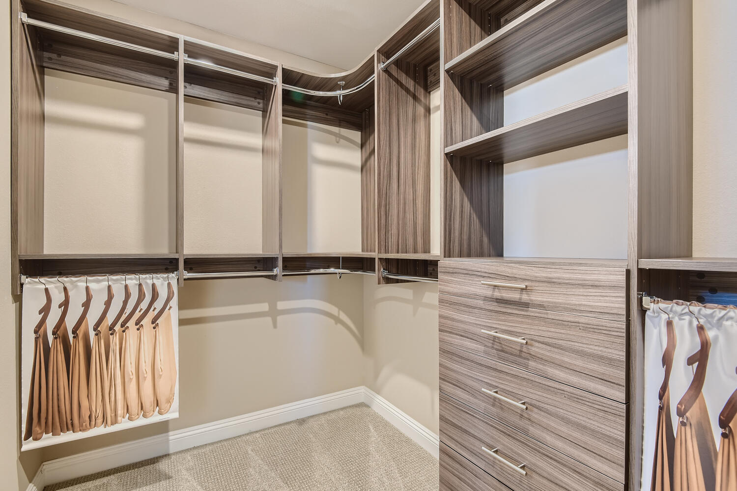 A room with a wood door and a window.