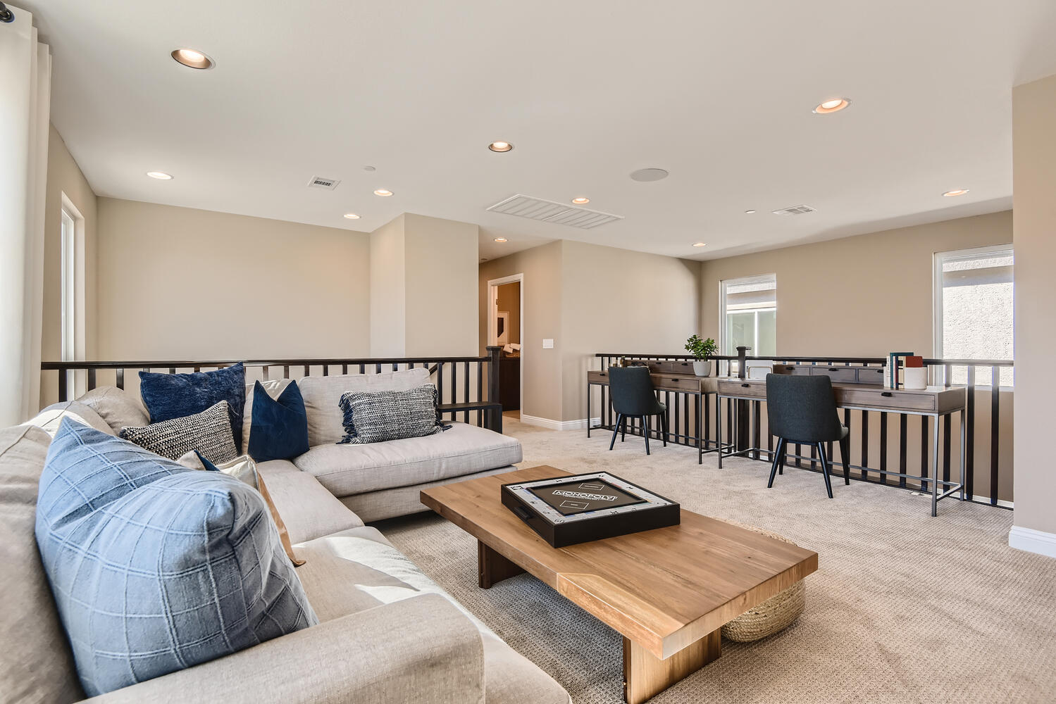 A large living room with a couch and a coffee table.