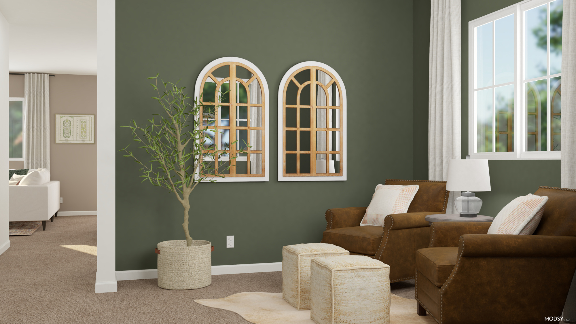 A living room with a green wall.