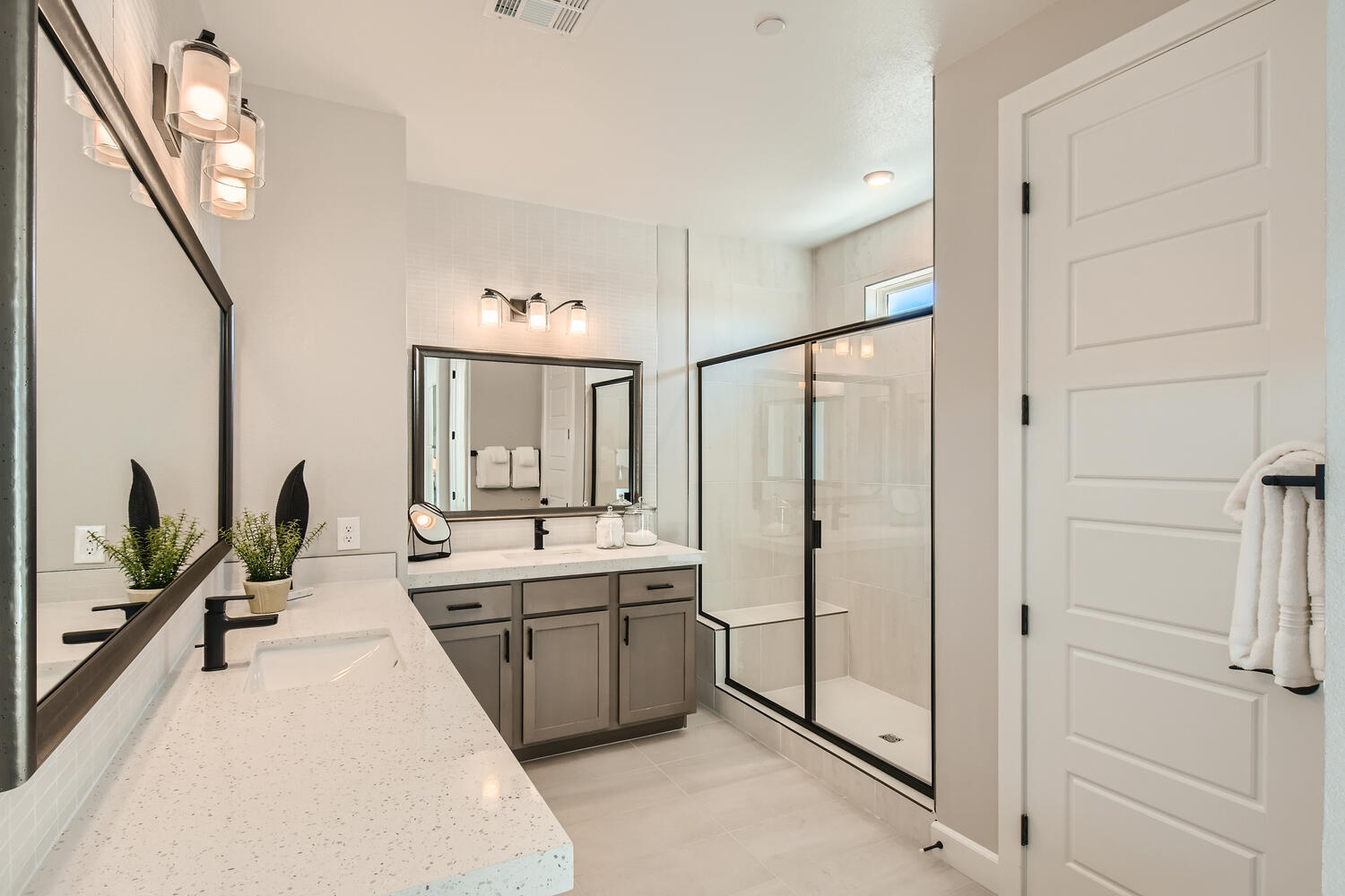 A bathroom with a glass shower.