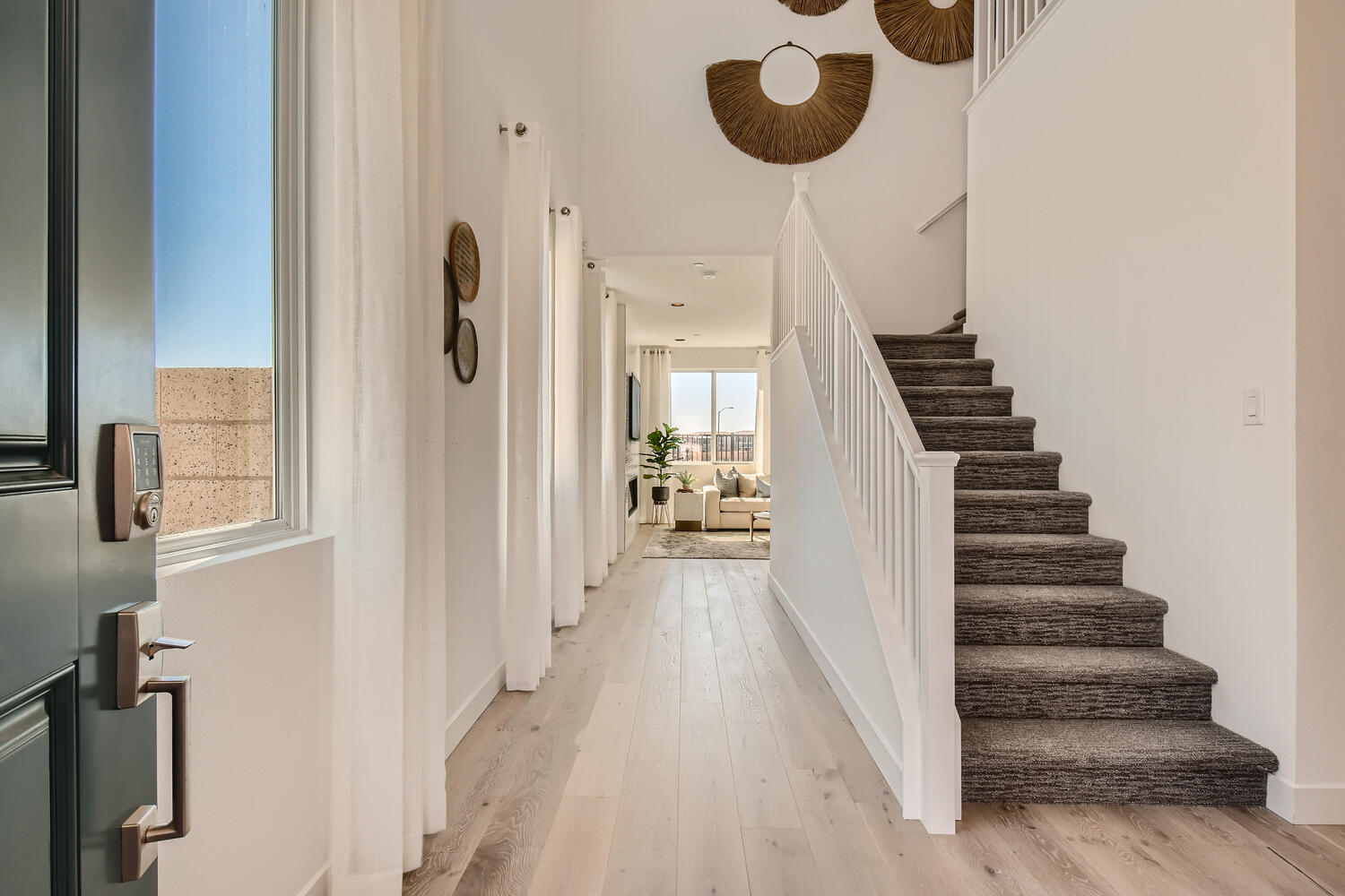 A long hallway with white walls.