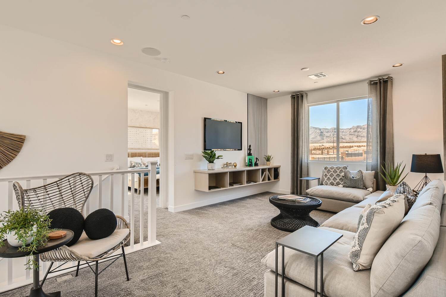 A living room with a tv and couches.