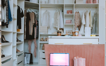 A room with shelves and a television.