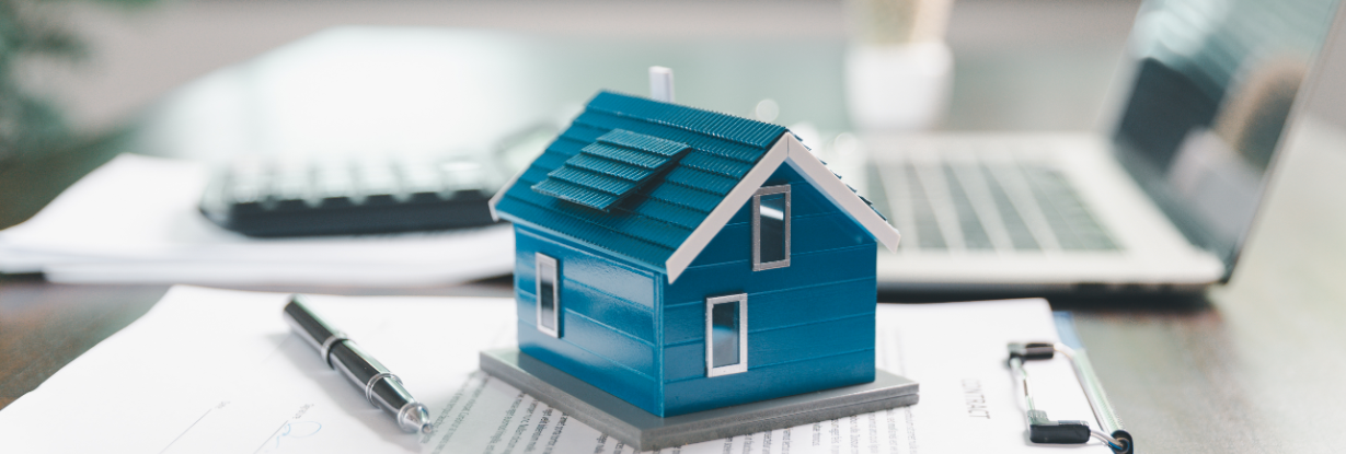 A blue model of a house.