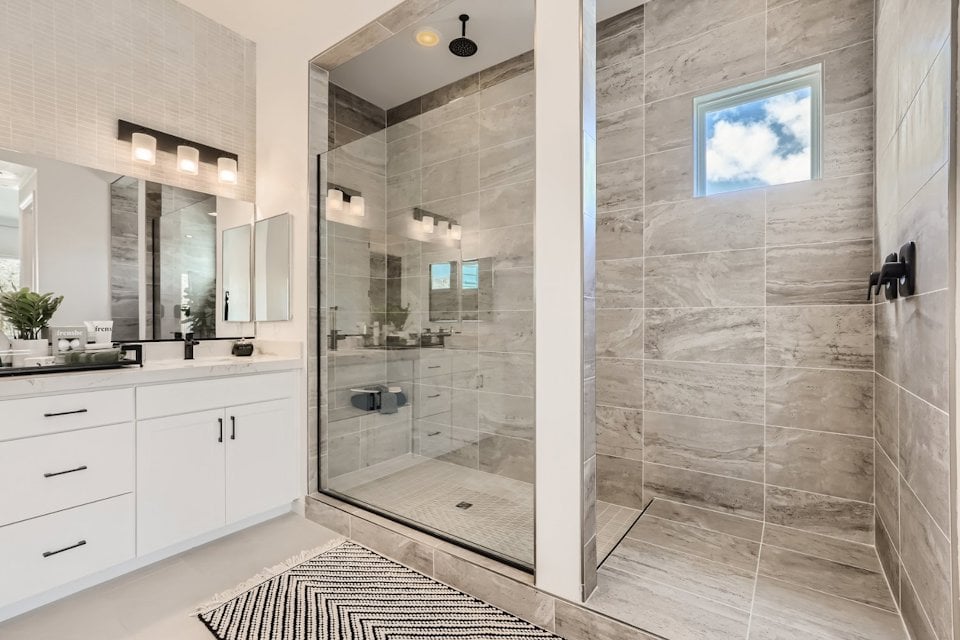 A bathroom with a glass shower.