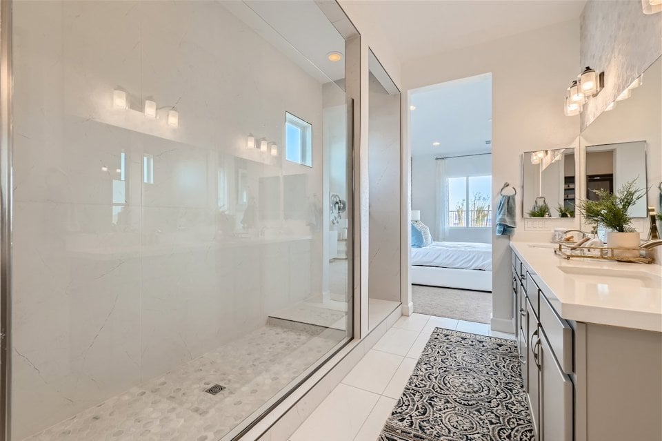 A bathroom with a glass shower.