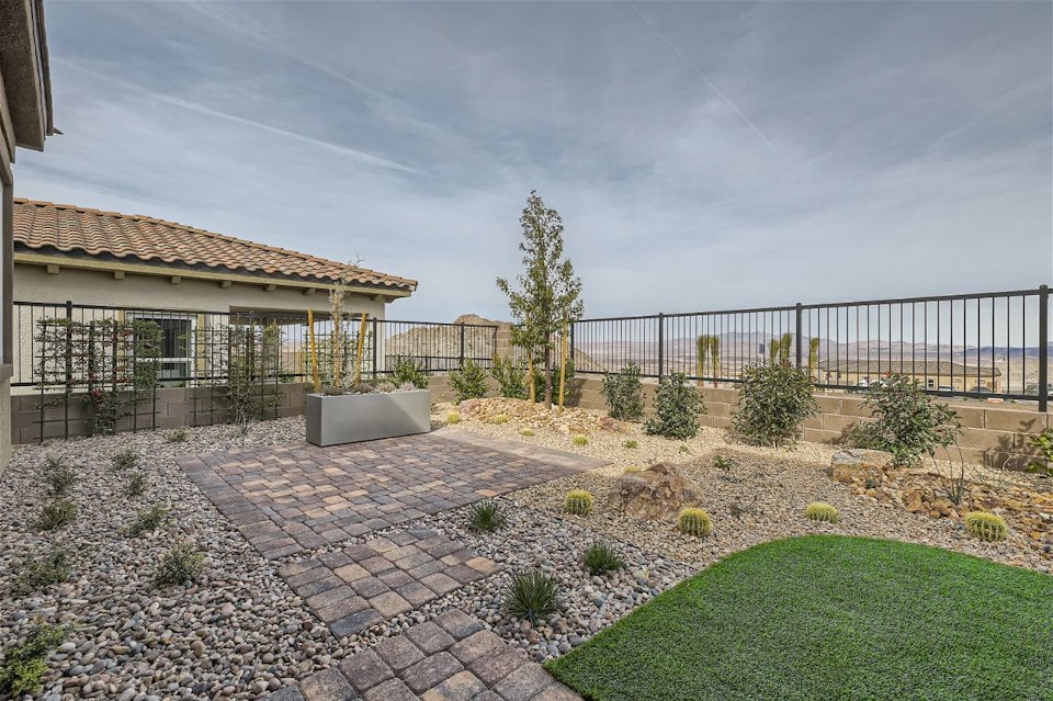 A garden in front of a house.