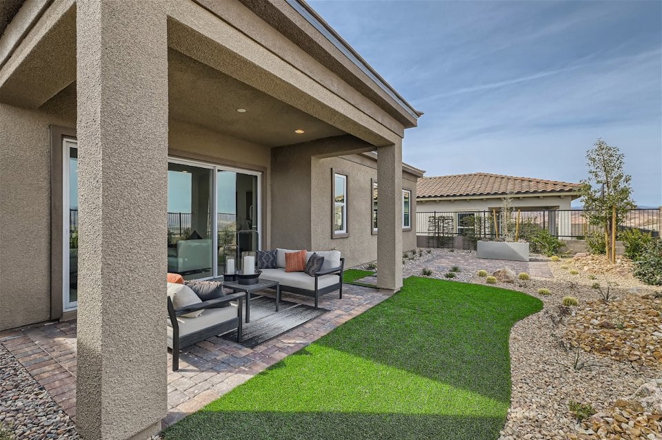 A house with a large front yard.