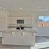 bravado, lot 62 plan 2222, kitchen & dining room, reedley ca