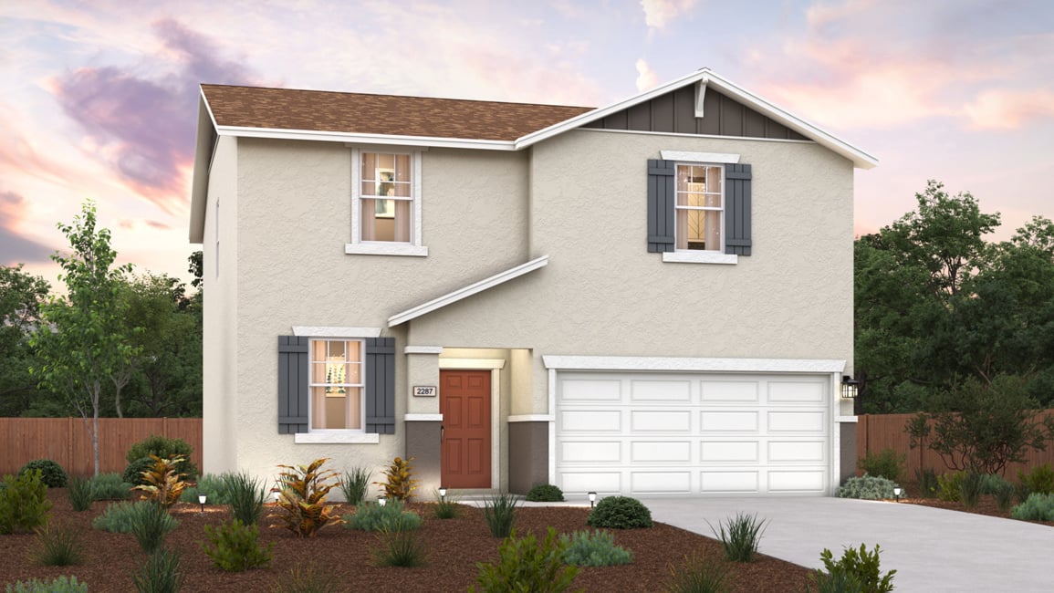 A house with a garage and a driveway.