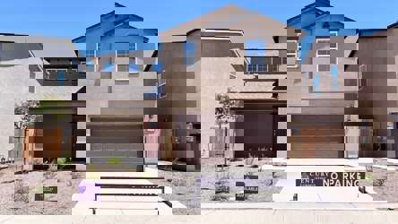 A building with a sign in front of it.