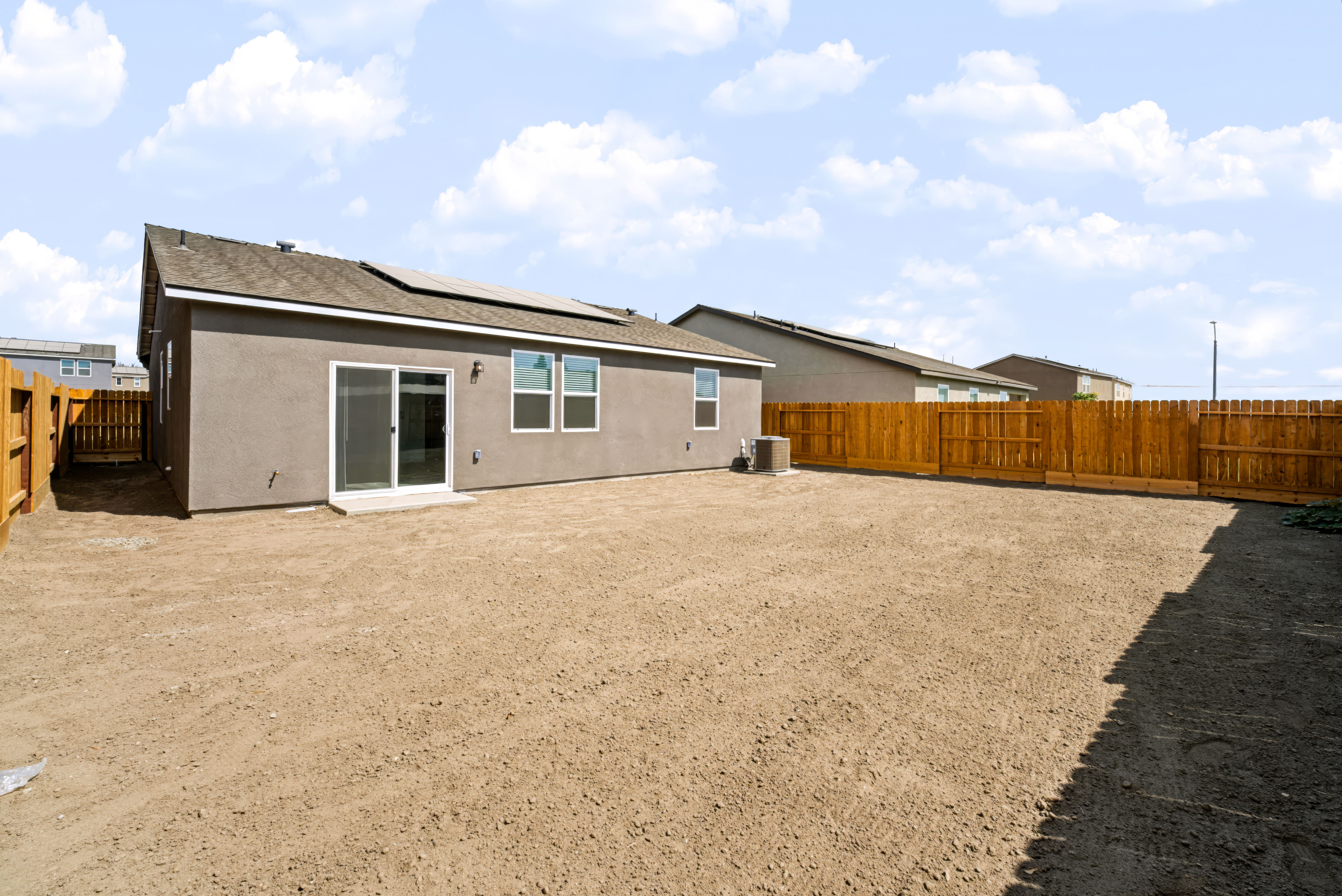 A house with a fence around it.