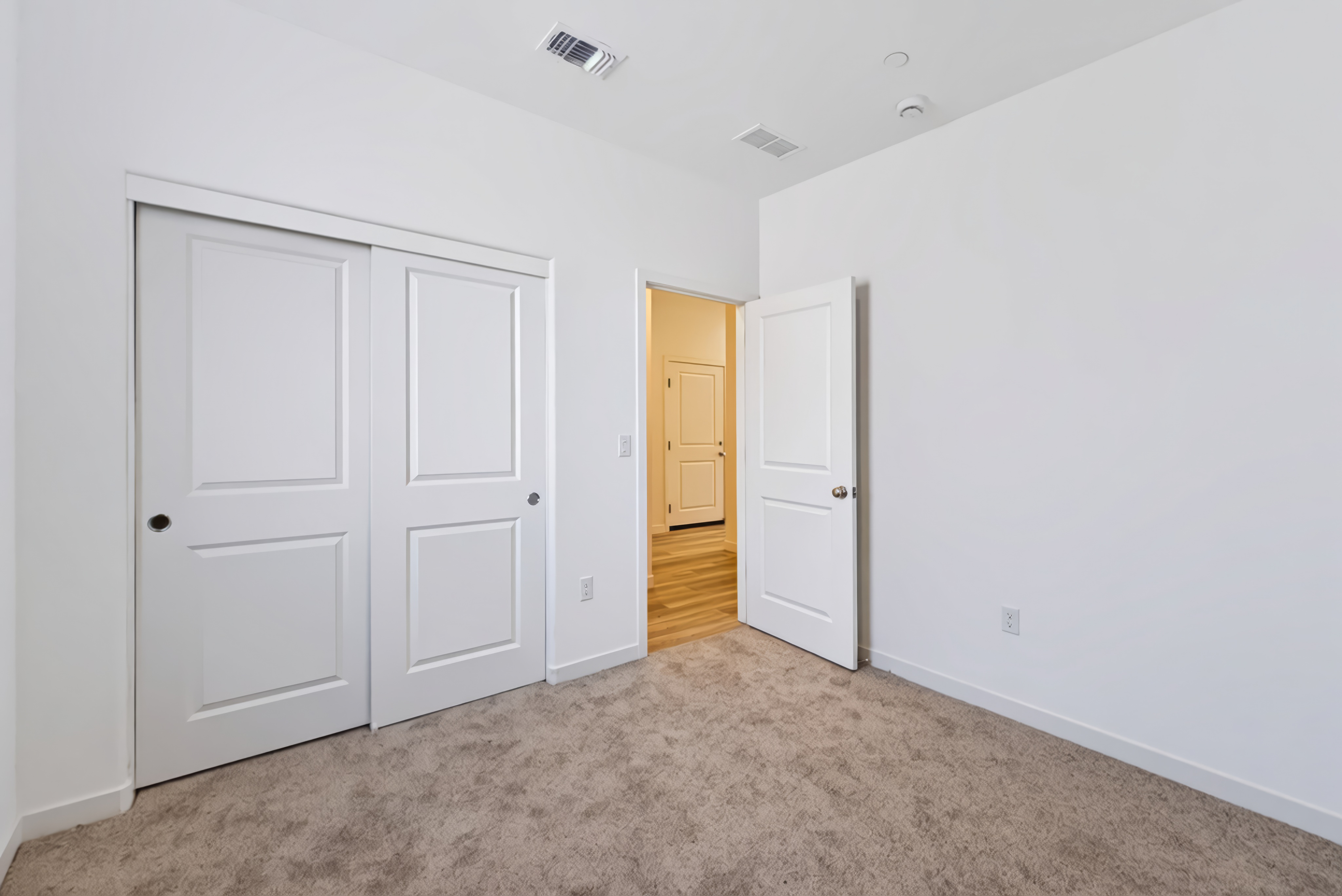 A room with white doors.