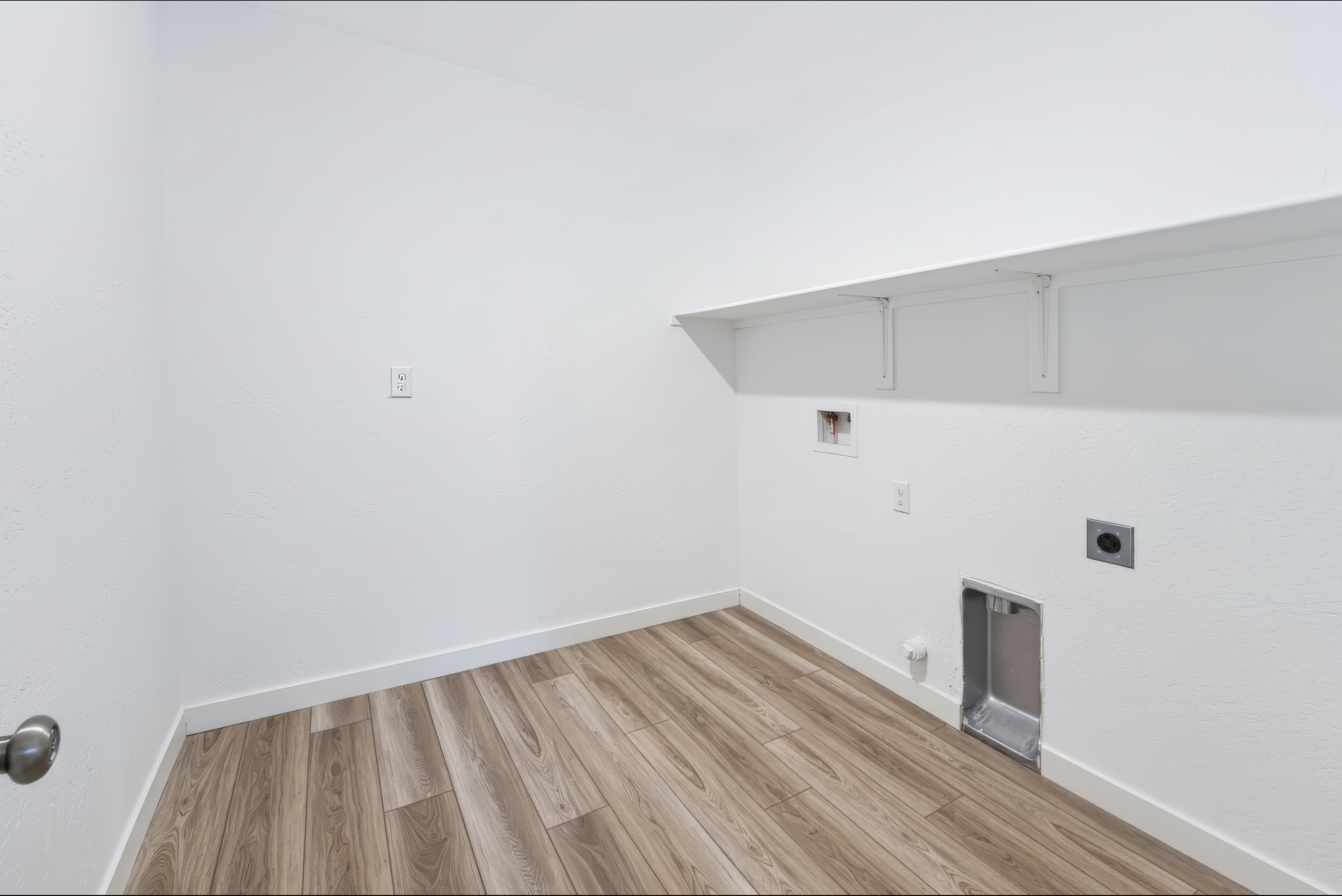 A room with white walls.