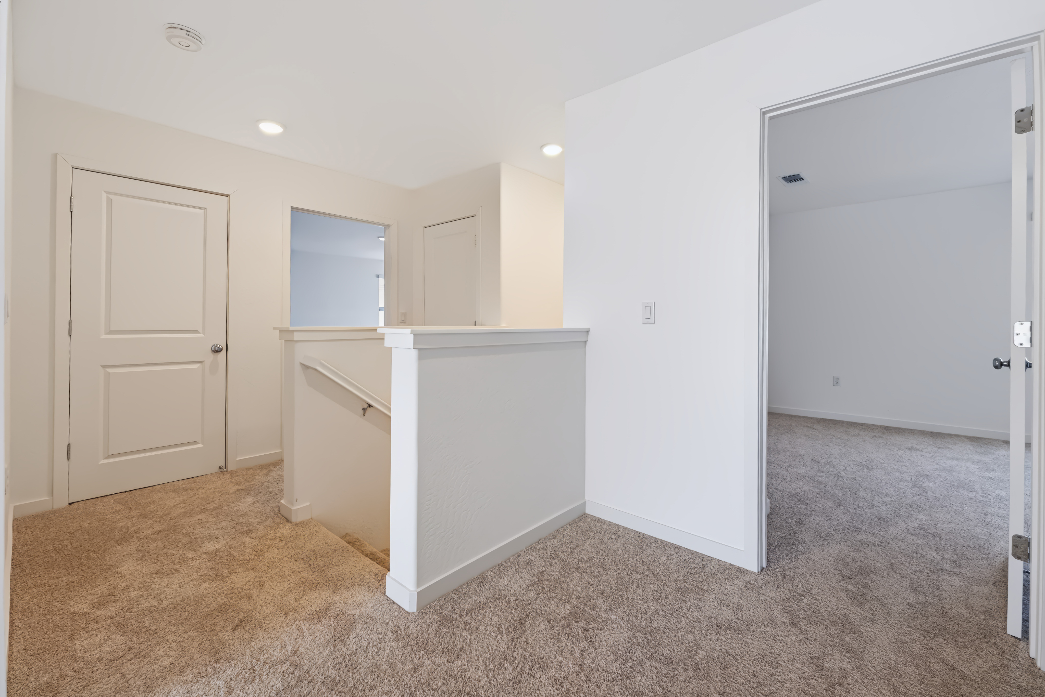 A room with white cabinets.