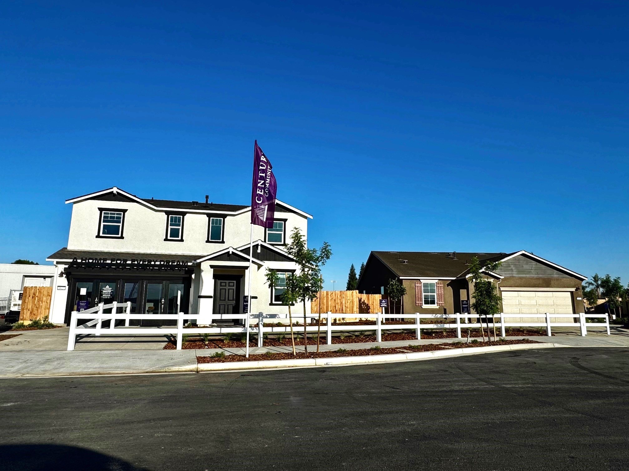 A house with a flag on the roof.