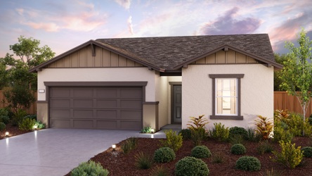 A house with a garage and a driveway.