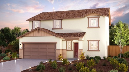 A house with a pond in the front.