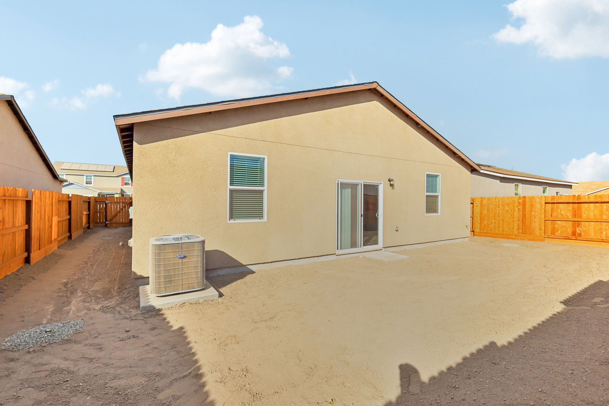 A house with a fence around it.