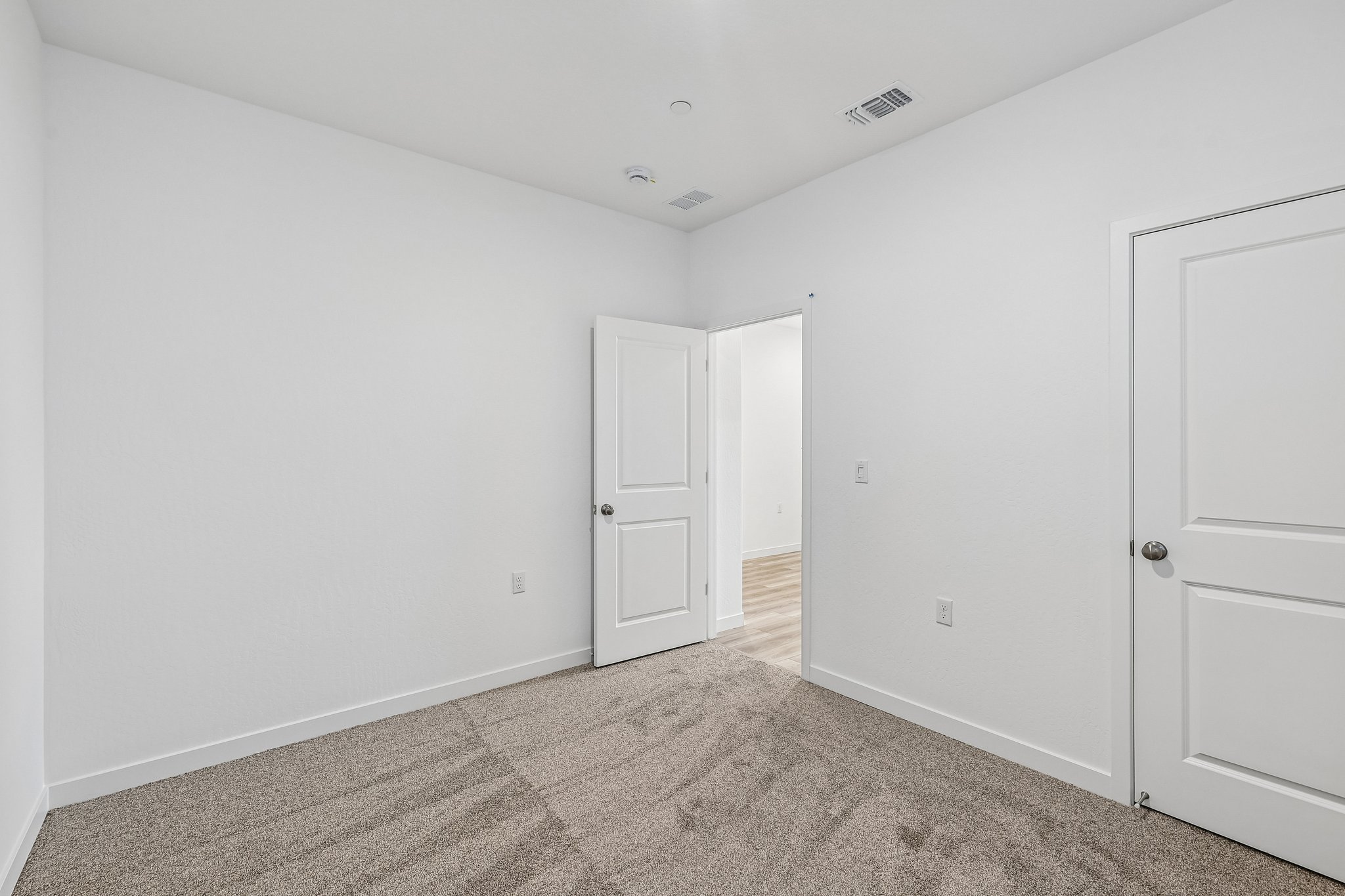 A room with white doors.