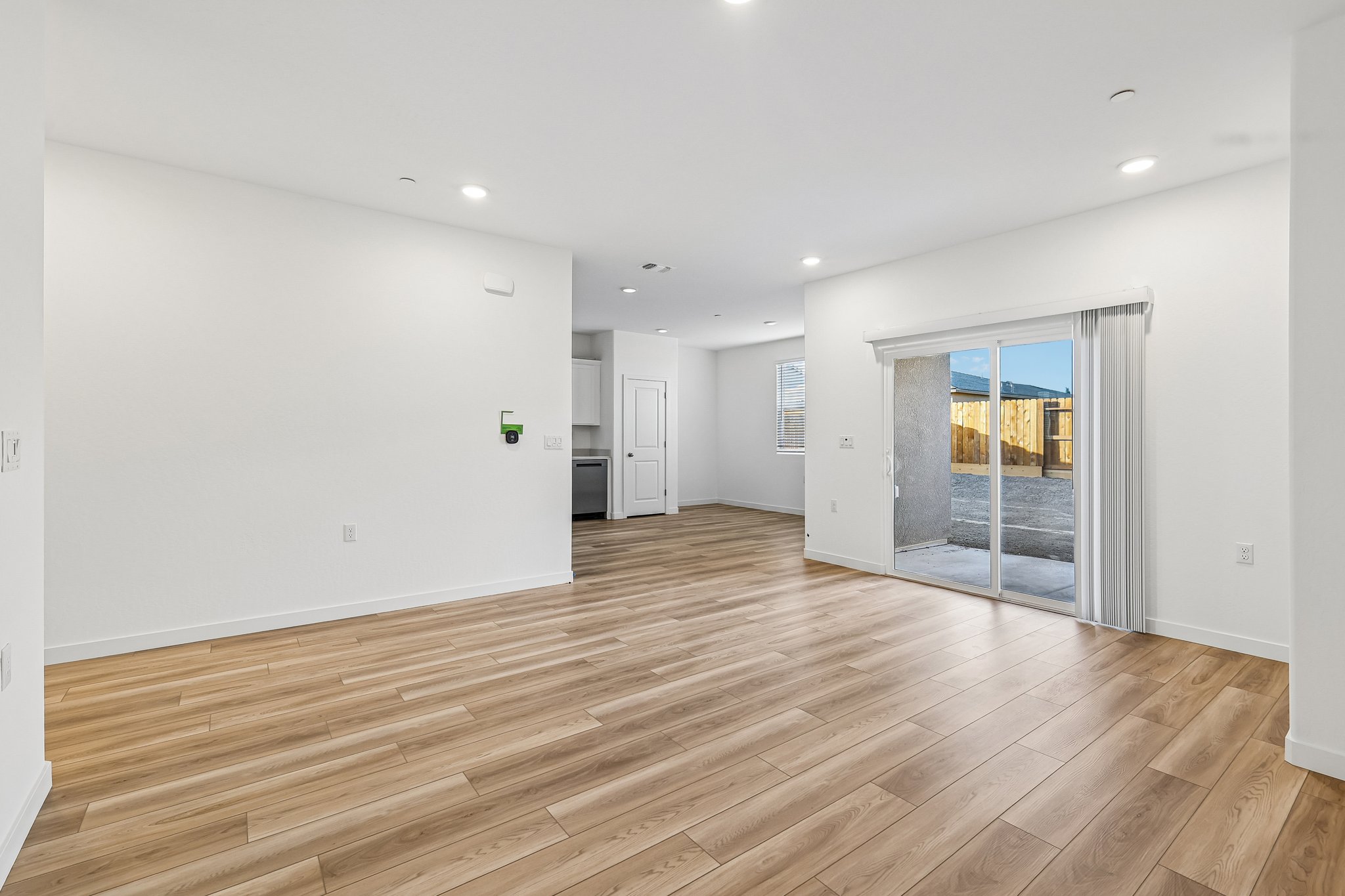 A room with a wood floor and a wood floor.
