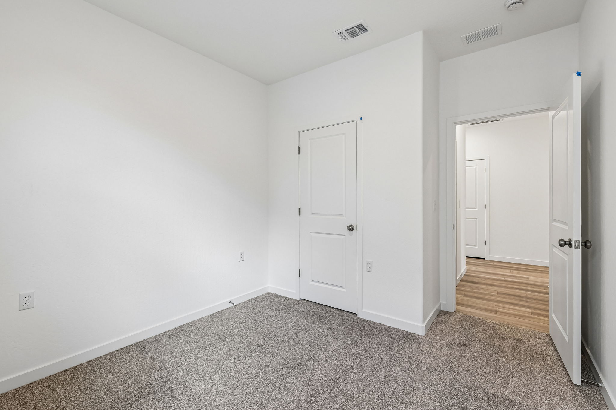 A room with white doors.