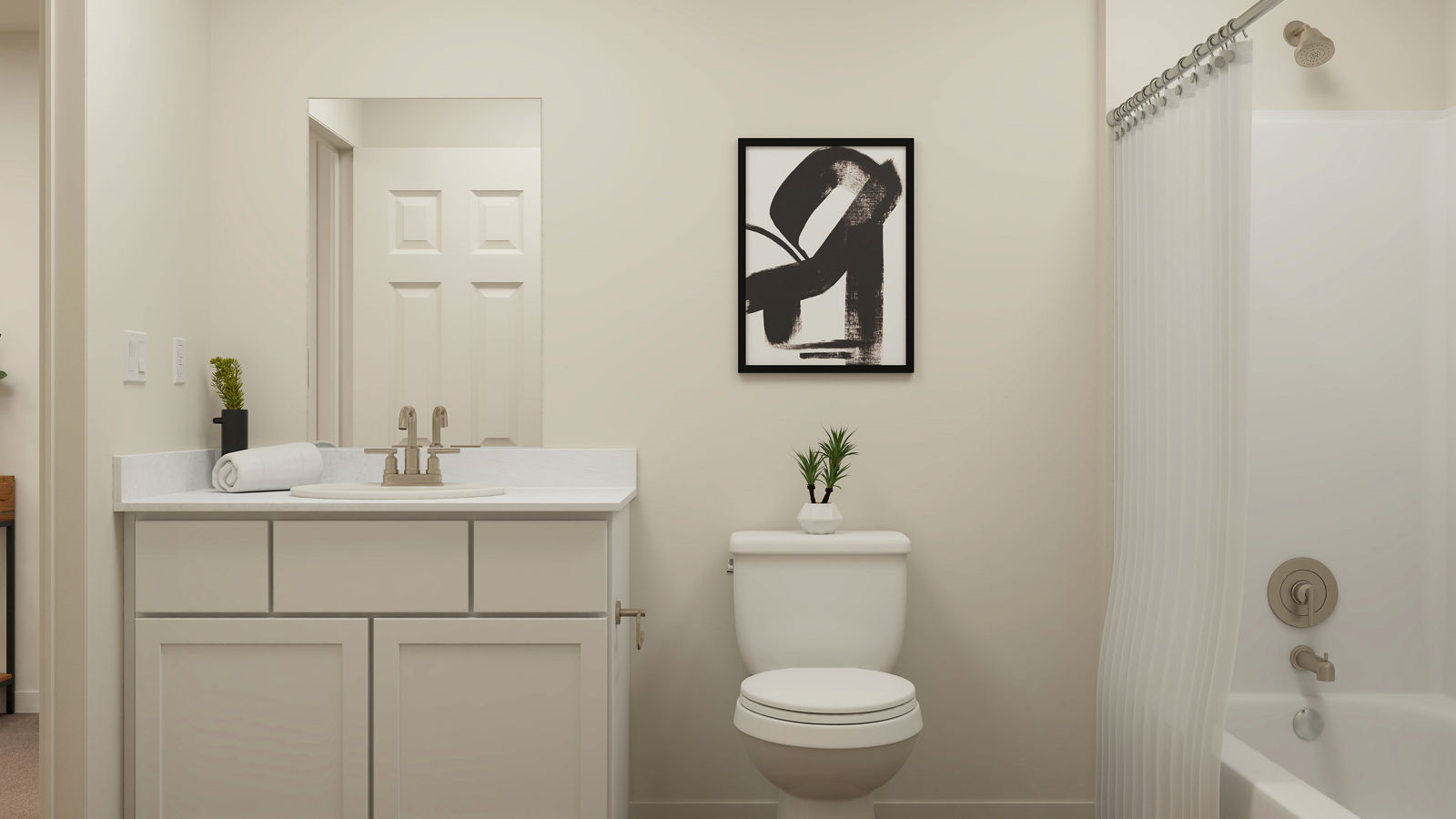 A bathroom with a toilet and sink.