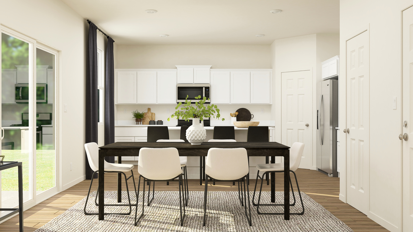 A room with a table and chairs.