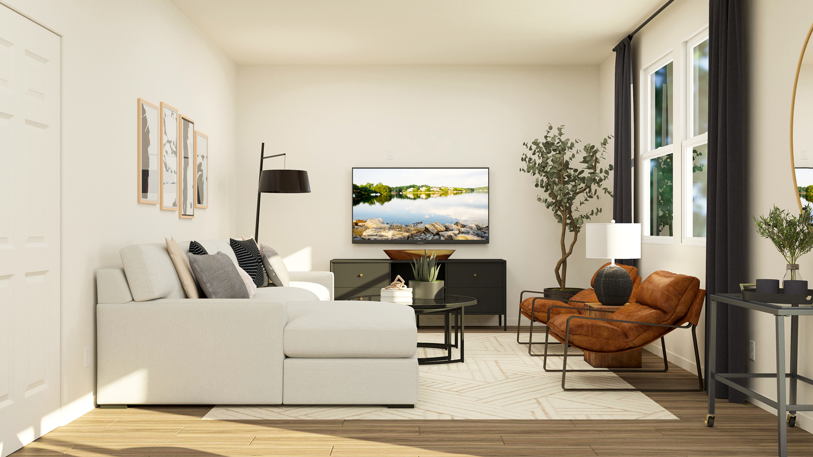 A living room with a white couch and a table.