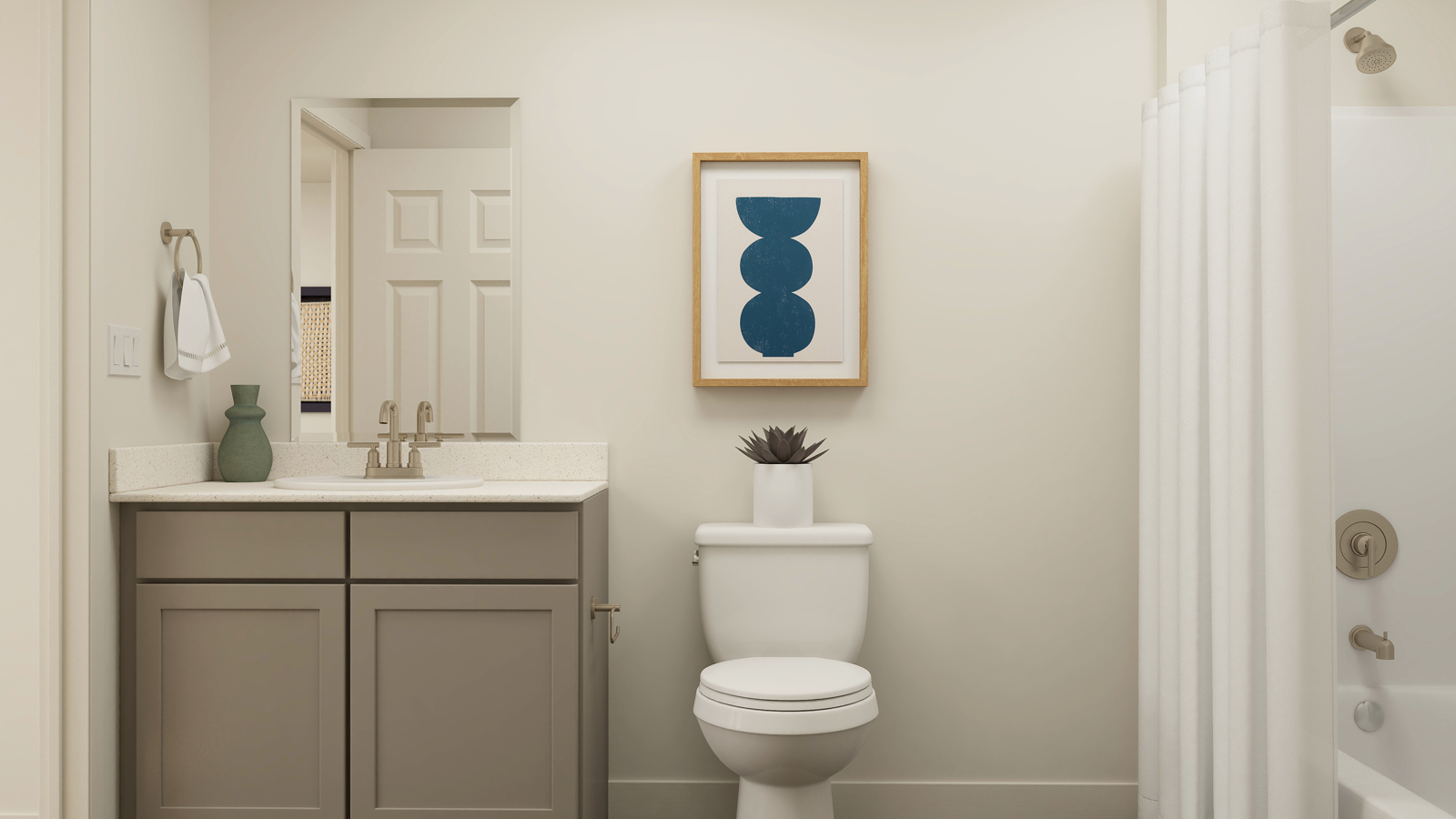 A bathroom with a toilet and a sink.