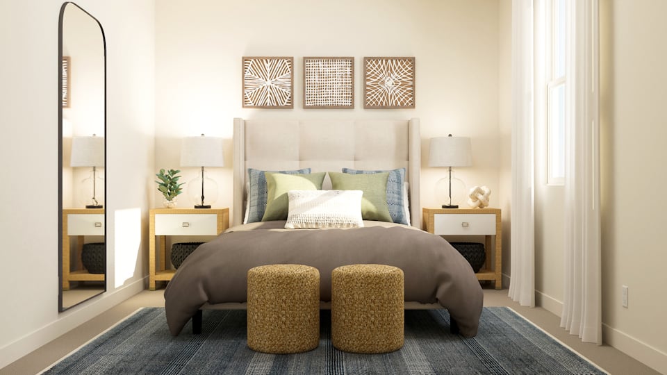 A room with a couch and lamps.