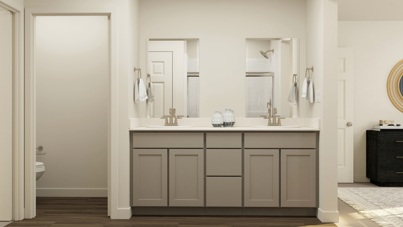 A bathroom with a large mirror.