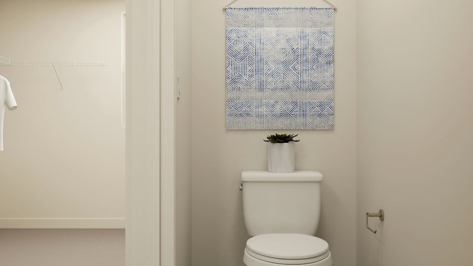 A plant in a toilet.